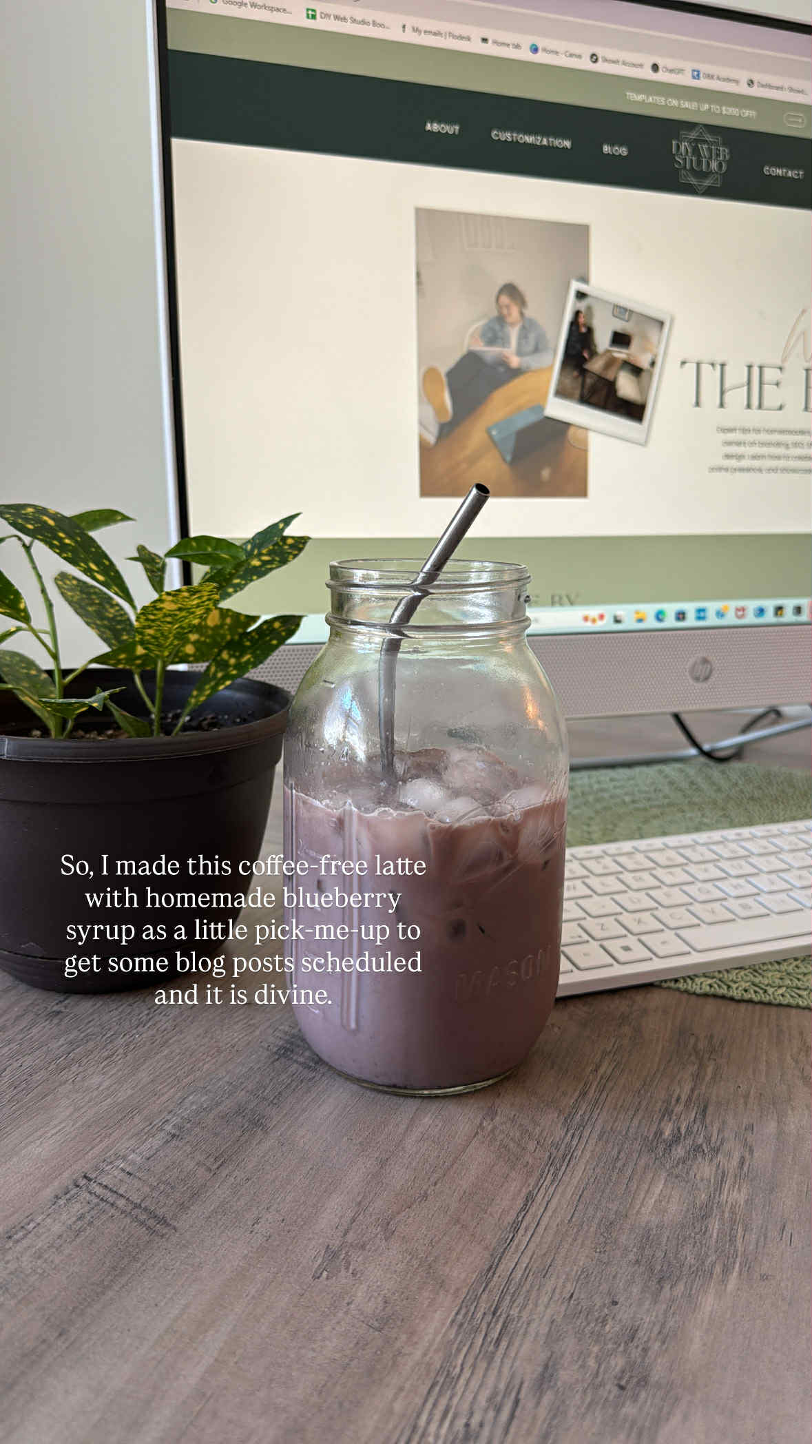 Blueberry syrup latte in a cozy mug next to a blog post draft on a notepad, styled for a simple living business.